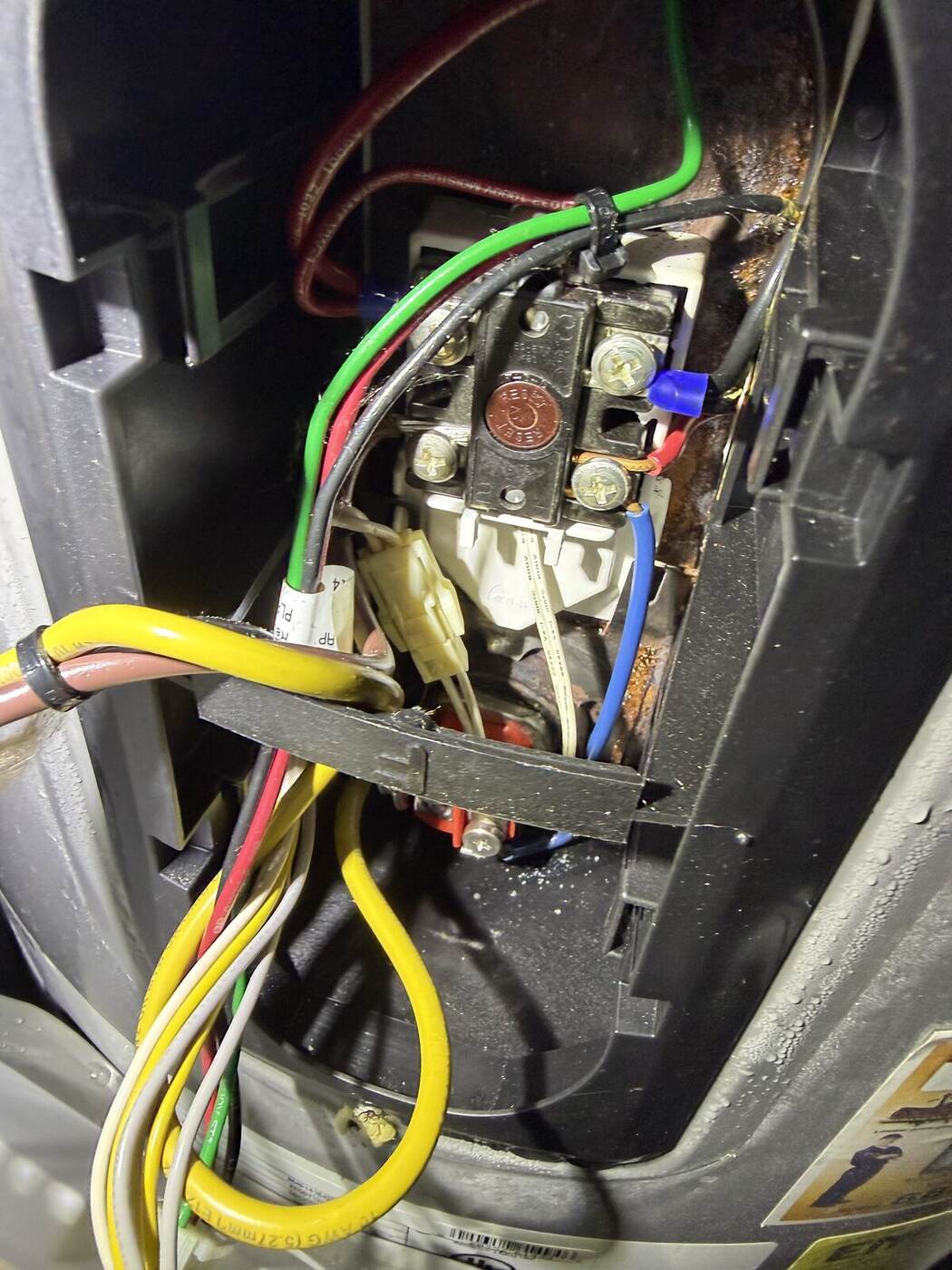 Corroded wiring compartment on the aging electric water heater removed from a McCormick Ranch home in Scottsdale
