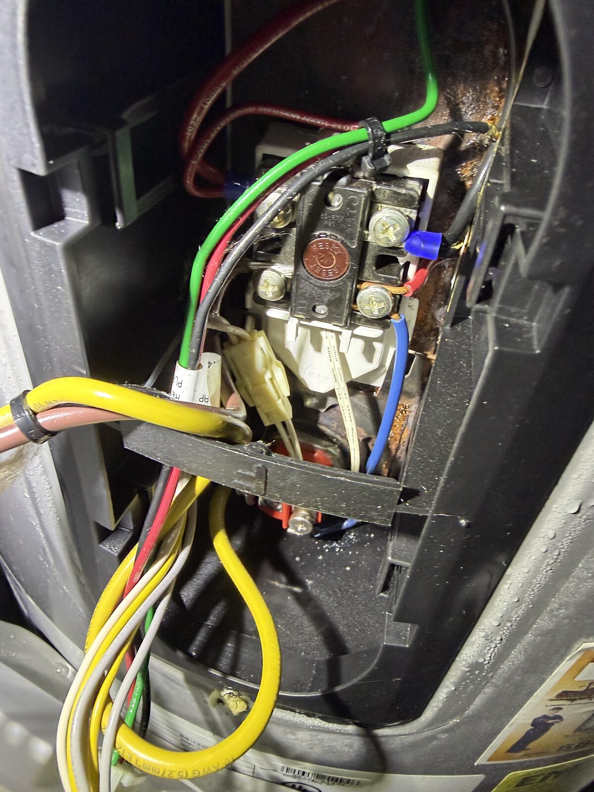 Corroded wiring compartment on the aging electric water heater removed from a Paradise Park Manor home in Scottsdale
