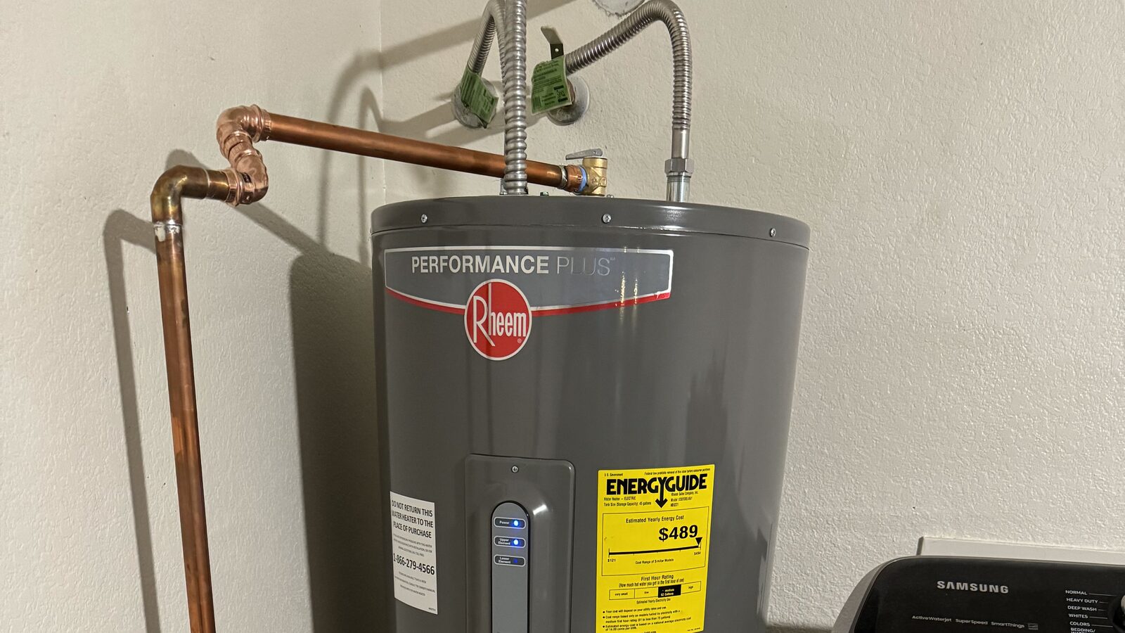 Newly installed Rheem tank water heater with fresh copper supply lines by Water Pros Plumbing in Gilbert AZ